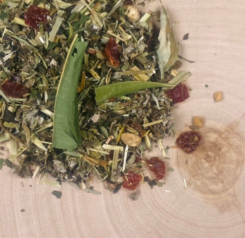 Herbal tisane with nice looking botanicals spread with lemon Fireweed leaves.