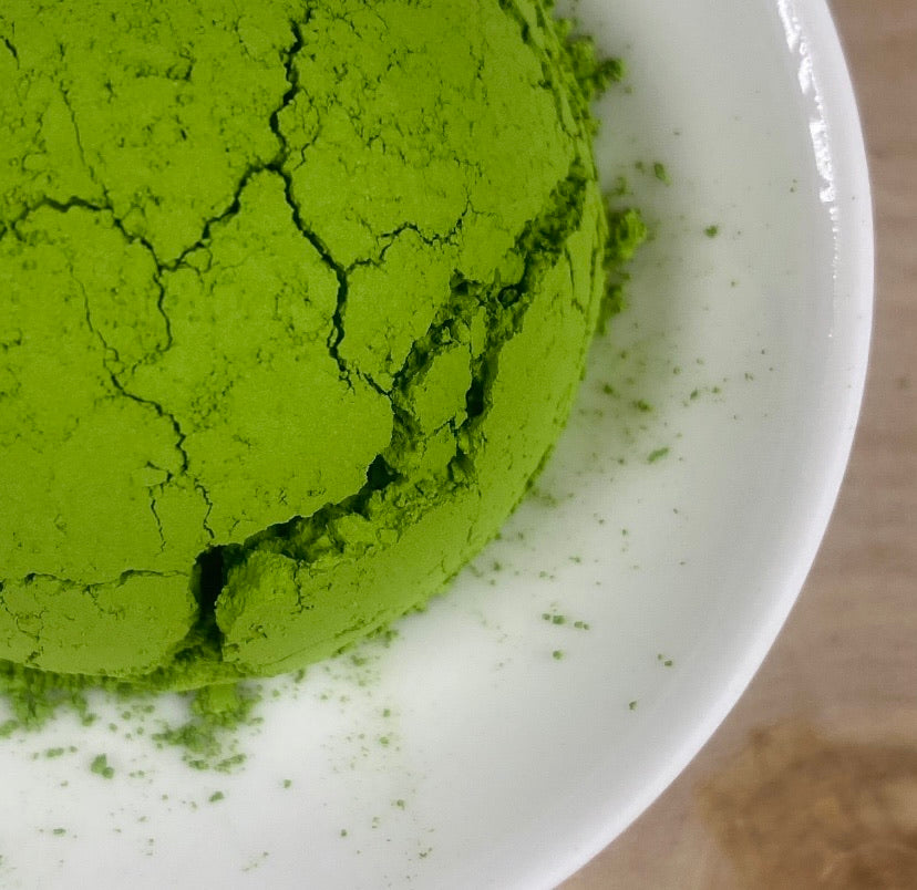 Cracked ice cream scoop style of an amazing vibrant green organic matcha.